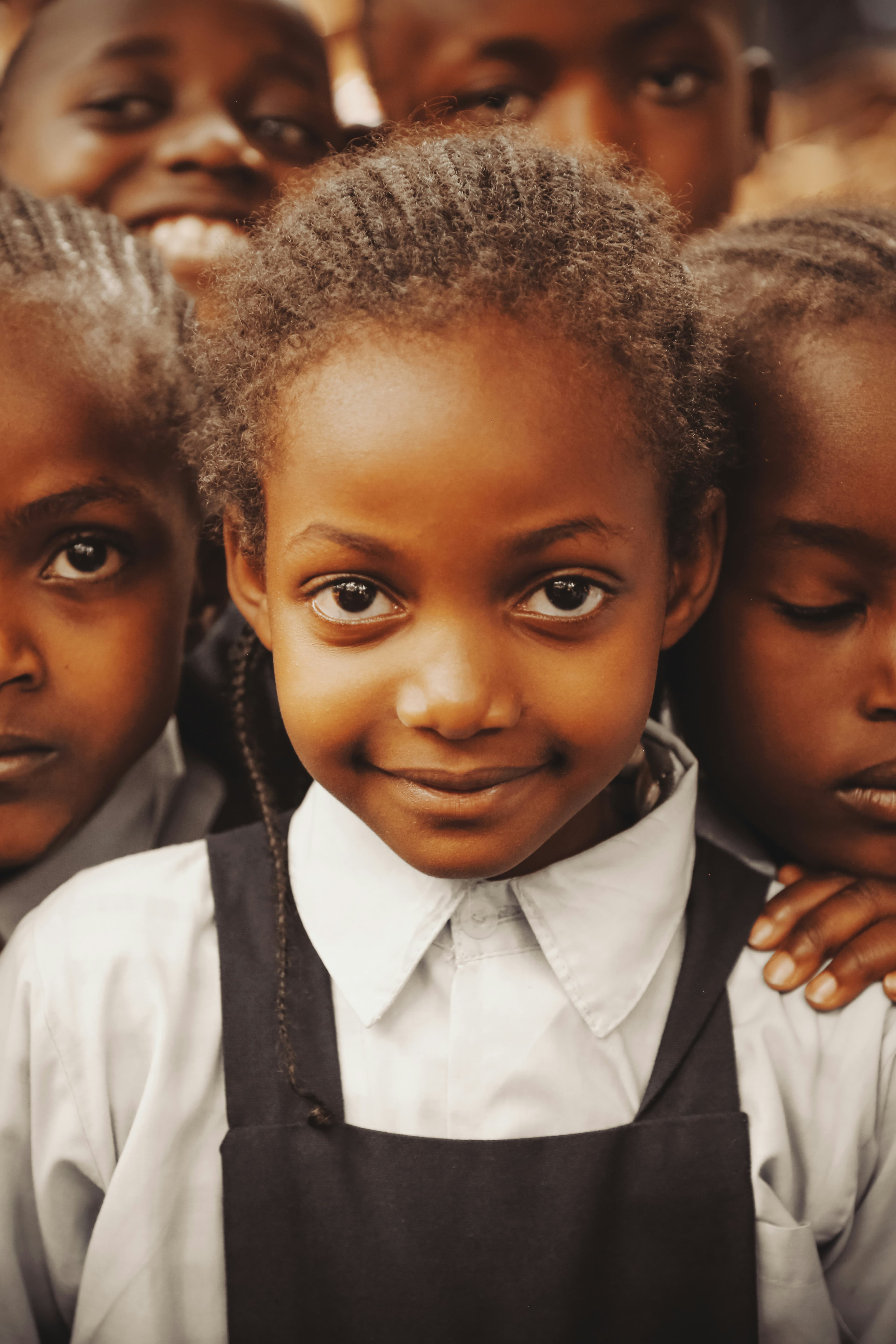 Smiling child representing African brilliance